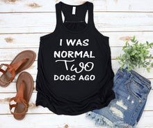 Load image into Gallery viewer, I was Normal Two Dogs Ago Ladies Flowy Racerback Tank Top Personalization available