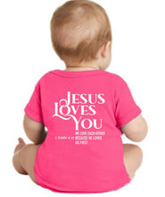 Load image into Gallery viewer, Baby wearing a pink shirt with 'Jesus Loves You' text on a white background