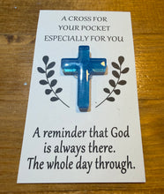 Load image into Gallery viewer, Blue cross on a card with text on a wooden surface