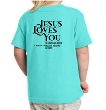 Load image into Gallery viewer, Child wearing a turquoise t-shirt with 'Jesus Loves You' text on the back.