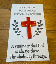 Load image into Gallery viewer, Red cross on a white card with text on a wooden surface
