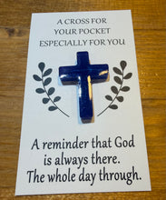 Load image into Gallery viewer, Blue cross pendant on a card with text on a wooden surface