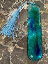 Load image into Gallery viewer, Decorative turquoise bookmark with a blue tassel on a marble surface
