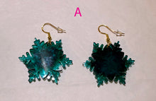 Load image into Gallery viewer, Pair of green floral earrings on a light gray background