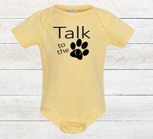 Load image into Gallery viewer, Yellow baby onesie with 'Talk to the paw' text on a wooden surface