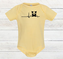 Load image into Gallery viewer, Yellow baby bodysuit with black cat graphic design on a wooden surface