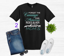Load image into Gallery viewer, Black t-shirt with Forget the Carriage this Princess rides in her Mom's Mustang text, blue jeans, white sneakers, sunglasses on a light gray background