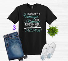 Load image into Gallery viewer, Black t-shirt with Forget the Carriage this Princess rides in her Mom's Mustang text design, paired with jeans, sneakers, and sunglasses on a light gray background.