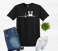 Load image into Gallery viewer, Black t-shirt with a cat heart rate design, blue jeans, white sneakers, and sunglasses on a white background.