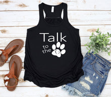 Load image into Gallery viewer, Black tank top with 'Talk to the Paw' text on a wooden surface with sandals and shorts.