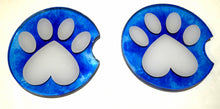 Load image into Gallery viewer, Two blue and white paw print coasters on a white background