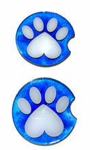 Load image into Gallery viewer, Two blue car coasters with white paw prints on a white background