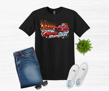Load image into Gallery viewer, A black graphic t-shirt featuring a 'Merry Stangmas' holiday design with Santa in a red car and reindeer, styled in a flat lay with blue jeans, white sneakers, sunglasses, and a small green plant on a white wood background.