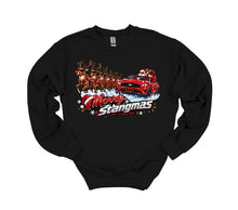 Load image into Gallery viewer, A black crewneck sweatshirt featuring a colorful graphic print of Santa Claus driving a red race car with reindeer, accompanied by the text 'Merry Stangmas'.