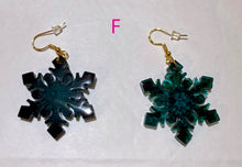 Load image into Gallery viewer, Pair of snowflake-shaped earrings on a white background