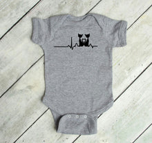 Load image into Gallery viewer, Gray baby bodysuit with a cat heart rate monitor design on a wooden floor