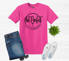 Load image into Gallery viewer, Pink t-shirt with 'Not Perfect Just Forgiven' text, blue jeans, white sneakers, sunglasses on a light gray background.