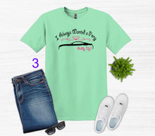 Load image into Gallery viewer, Green t-shirt with graphic design, blue jeans, white sneakers, sunglasses on a white background