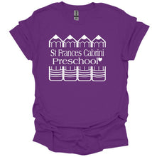 Load image into Gallery viewer, A purple short-sleeve t-shirt with a white graphic print on the front reading 'St Frances Cabini Preschool' with small house and chair illustrations, shown on a plain white background.