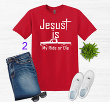 Load image into Gallery viewer, Red t-shirt with 'Jesus is My Ride or Die' text, paired with jeans, sneakers, and sunglasses on a white background.