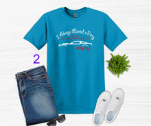 Load image into Gallery viewer, Blue t-shirt with graphic design, jeans, white sneakers, and sunglasses on a light gray background