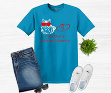 Load image into Gallery viewer, Blue t-shirt with a graphic design, jeans, sunglasses, and white sneakers on a white background