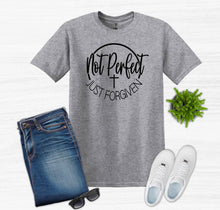 Load image into Gallery viewer, Gray t-shirt with 'Not Perfect Just Forgiven' text, paired with jeans, sunglasses, and sneakers on a white background.