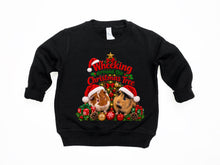Load image into Gallery viewer, A black toddler sweatshirt with a festive Christmas graphic featuring two guinea pigs in Santa hats and the text 'Wheeking Around the Christmas Tree', 