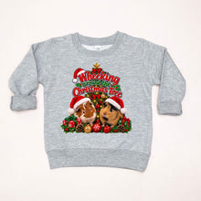 Load image into Gallery viewer, A light heather gray long-sleeve crewneck sweatshirt featuring a festive Christmas graphic of two guinea pigs wearing Santa hats, surrounded by ornaments, pinecones, and the text 'Wheeking around the Christmas Tree'.
