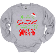 Load image into Gallery viewer, Gray sweatshirt with Christmas-themed text on a white background