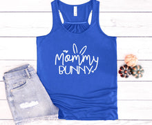 Load image into Gallery viewer, Blue tank top with 'Mommy Bunny' text on a white wooden surface with denim shorts and decorative items.