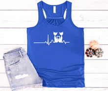 Load image into Gallery viewer, Blue tank top with cat design and shorts on a wooden surface