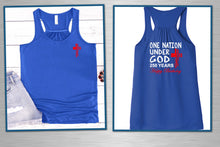Load image into Gallery viewer, Two blue tank tops with red and white text and graphics on a wooden background.