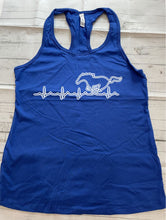 Load image into Gallery viewer, Blue tank top with a white graphic design on a wooden surface