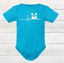Load image into Gallery viewer, Blue baby bodysuit with white cat graphic design on a wooden surface