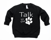 Load image into Gallery viewer, Black sweatshirt with 'Talk to the Paw' text and paw print design on a white background